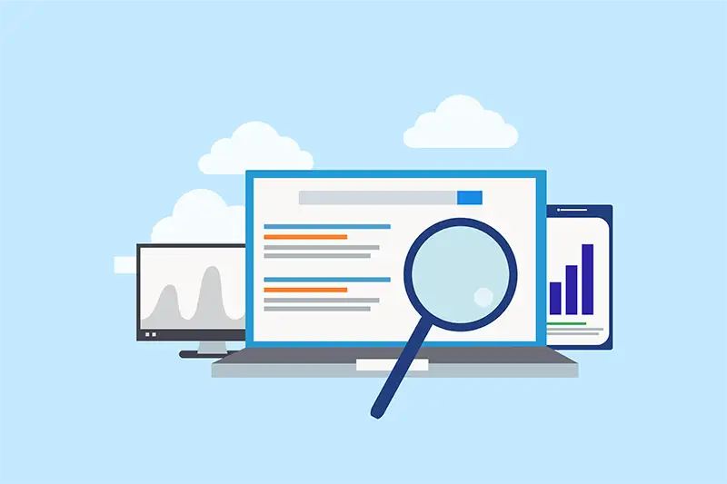 Magnifying glass over laptop with search results