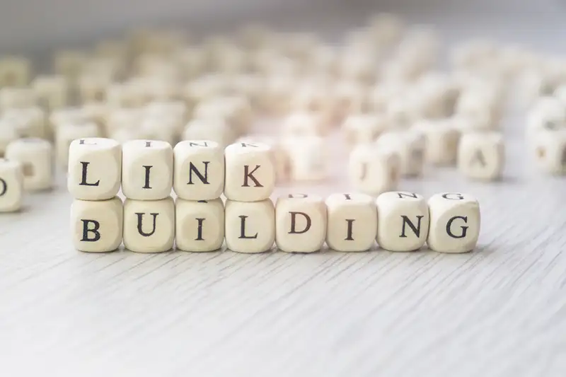 Blocks that spell out 'link building'